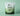 A 2lb pouch of TAHA natural unfavored Mind & Body protein blend on a light green background.